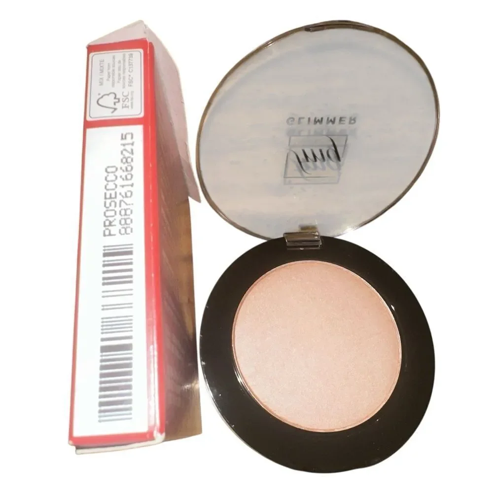 Avon fmg Glimmer Face Powder Illuminator in Prosecco.
